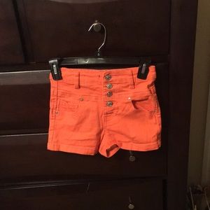 Orange high waisted shorts